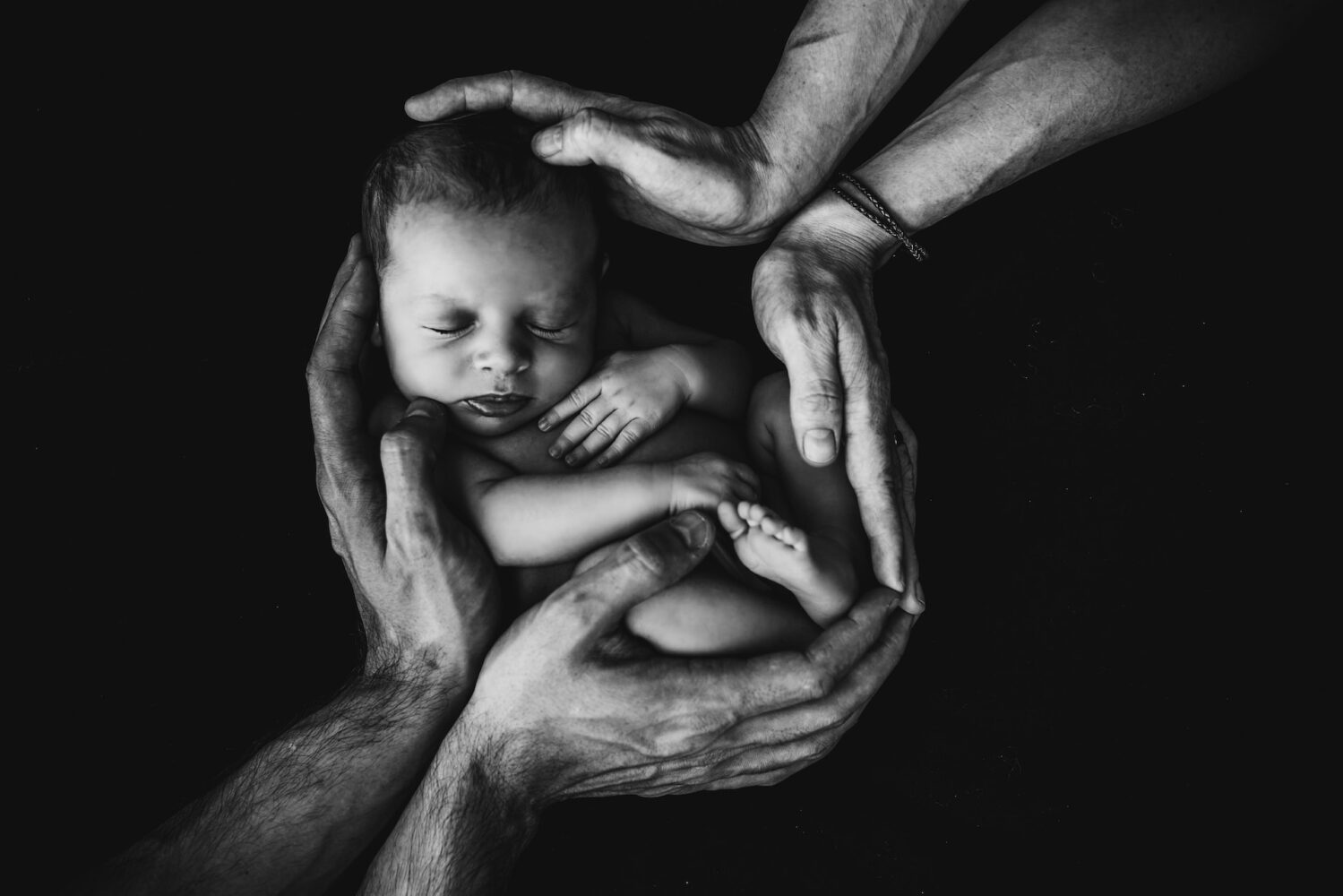 Baby in handen